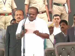 HDK takes oath amid opposition show of strength